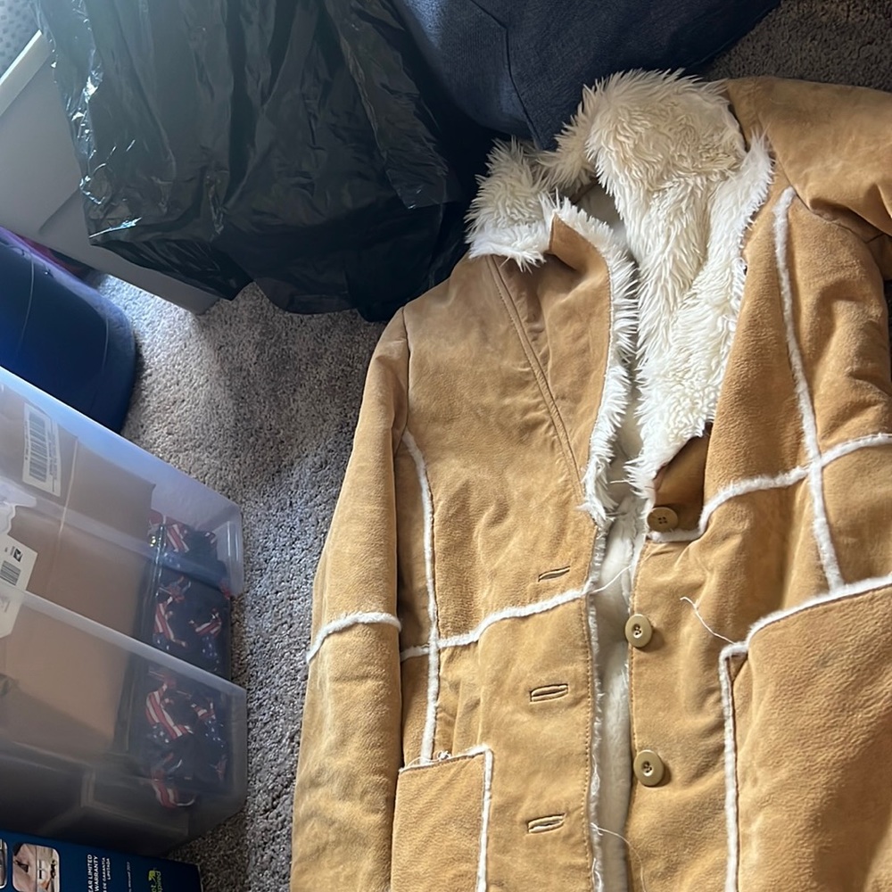 Wilson’s leather coat